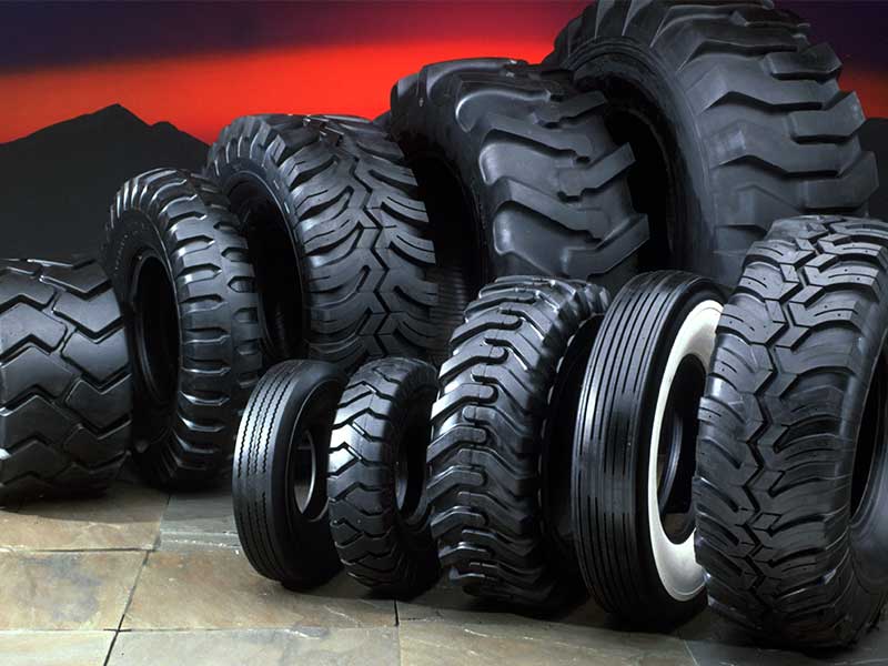 several sizes of different tyres stacked up